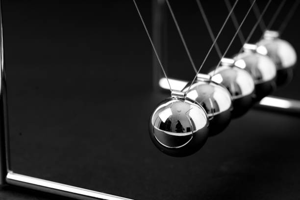 istock Newtons Cradle balancing balls, business concept in studio 1097459190