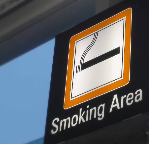 istock Smoking Area Sign Board And Sky Scenery 1097462124