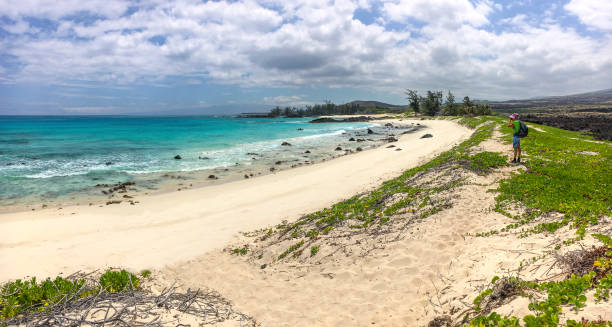 istock Hiking the sand dunes at Makalawena Beach 1097463022