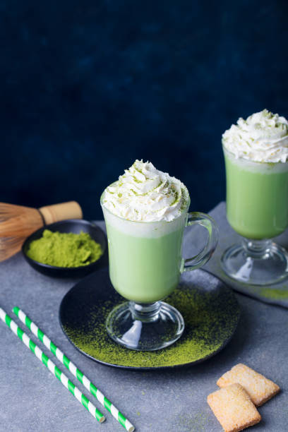 istock Matcha green tea latte with whipped cream. Copy space. 1097466220