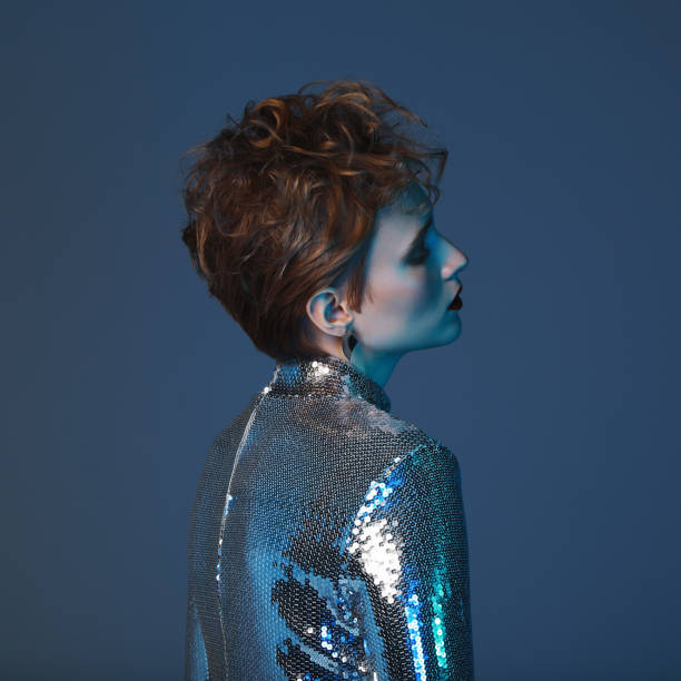 istock Woman in sequin jumpsuit 1097467038