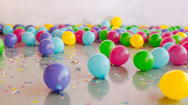 istock multicolored balloons floor holiday party 1097470248