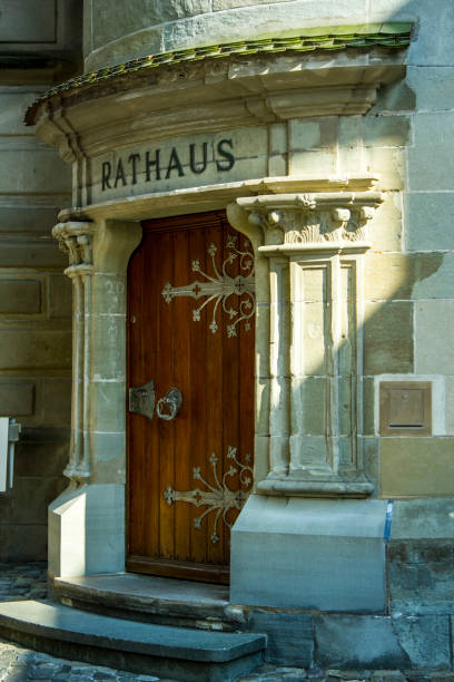 istock Small wooden city hall door 1097470324