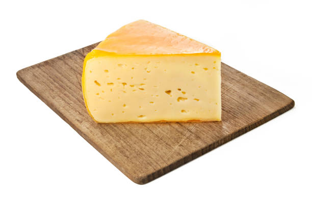 istock Cheese and board isolated against white background 1097470672