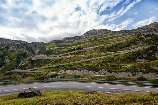 Impressive pass road in the Swiss alps. The Grimsel Pass connects the cantons of Valais, Berne and Uri.