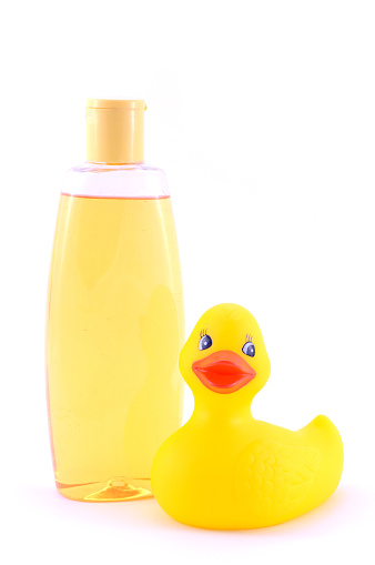 Isolated shot of some baby bathing soap and a rubber duck.