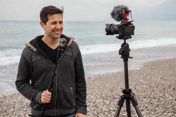 istock Vlogger making video about cameras and photography 1097482724
