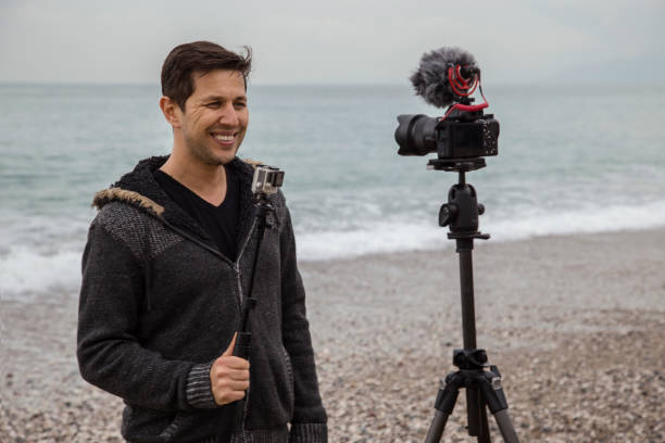 istock Vlogger making video about cameras and photography 1097484582