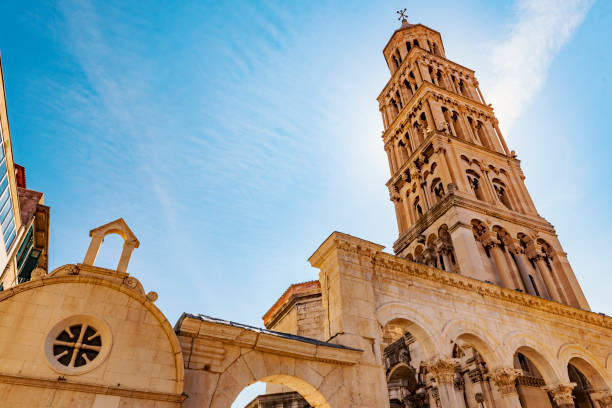 Cathedral Sv. Duje with Saint Domnius Bell Tower at Diocletian's Palace in Split, Croatia Split, an amazing city at the Adriatic Sea, Croatia, UNESCO WORLD HERITAGE SITE bell tower tower stock pictures, royalty-free photos & images
