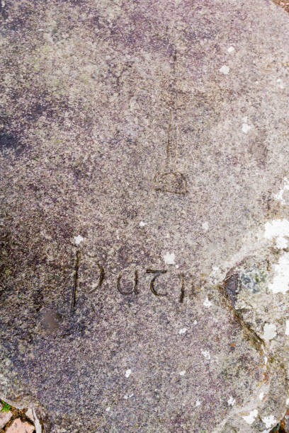istock Inscription on Saint Patrick Gravesite Stone at Down Cathedral 1097490160