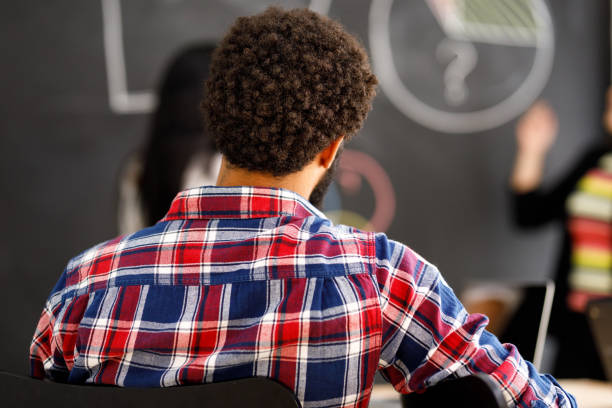 istock Man paying attention at meeting 1097491174