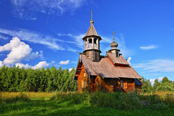 istock Wooden Church in a forest clearing 1097498328