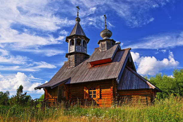 istock Old wooden Church in a forest clearing 1097498332
