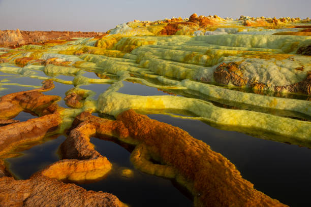hot springs in the danakil depression hot springs in the danakil depression with colourful mineral deposits danakil depression stock pictures, royalty-free photos & images