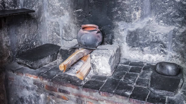 istock The old hearth with a cast iron boiler 1097504320
