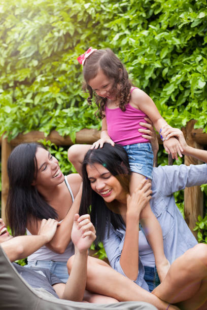 istock Family playing in the garden 1097504620