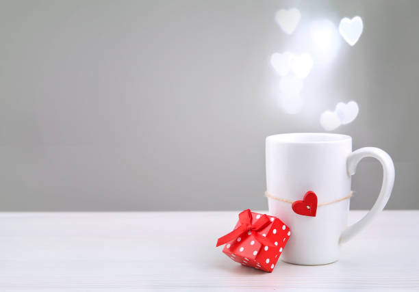 istock Valentine's day background,mother's day.White mug with present box. 1097512348