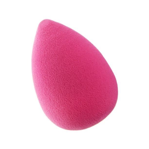 Make up sponge Make up sponge against a white background cleaning sponge photos stock pictures, royalty-free photos & images