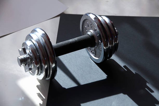 istock Gym and dumbbell weight training equipment on sport 1097536822