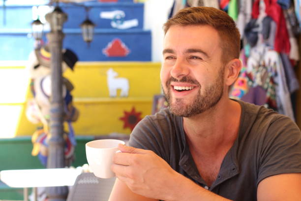 istock Cheerful brunette man holding a mug 1097539772