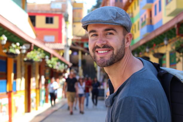 istock Man strolling around the colourful Guatape (Colombia) 1097539796