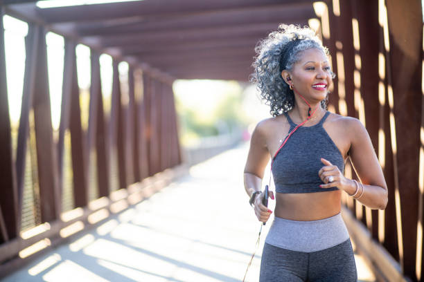 istock A Black Woman Running on a bridge 1097542762