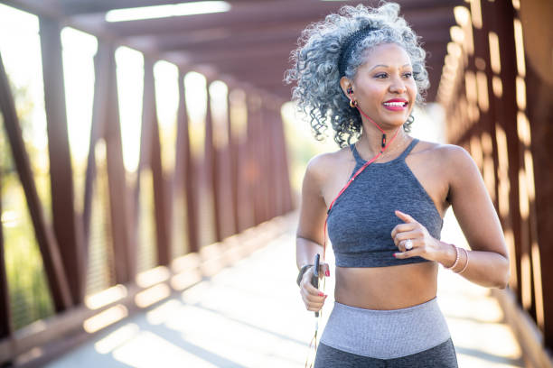 istock A Black Woman Running on a bridge 1097542774