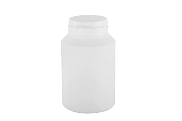 istock Closed white medicine bottle isolated on white background 1097548362