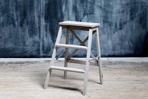 istock Construction stool near the dark wall, smeared with chalk 1097549968