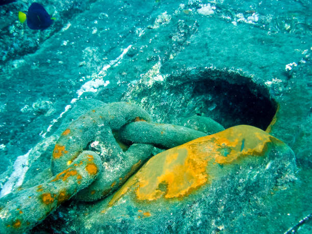 istock Old chain lifting mechanism anchors on a sunken ship. 1097553880