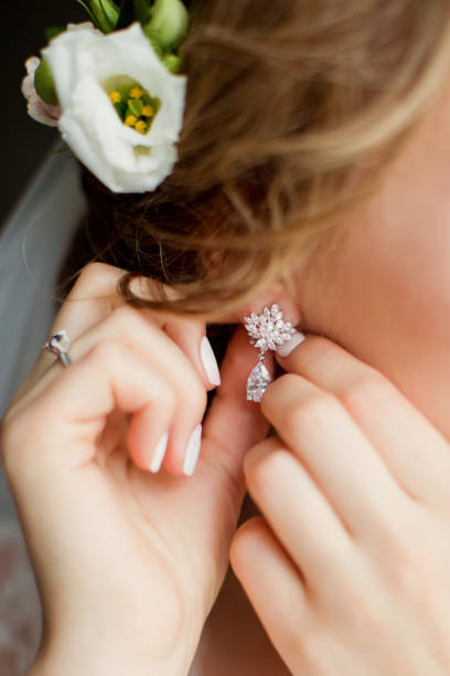 istock beautiful silver earrings with diamods 1097566878