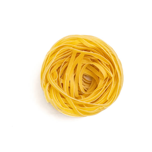 istock Round pasta isolated on a white background. Top view 1097567578