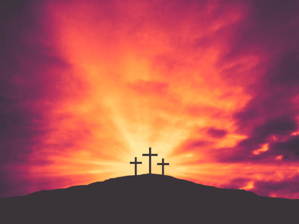 Three Christian Easter Crosses on Hill of Calvary with Colorful Clouds in Sky Three Christian Easter Crosses on Hill of Calvary with Colorful Clouds in Sky - Crucifixion of Jesus Christ religious equipment photos stock pictures, royalty-free photos & images
