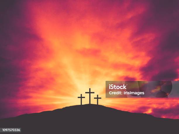 Three Christian Easter Crosses On Hill Of Calvary With Colorful Clouds In Sky Stock Photo - Download Image Now