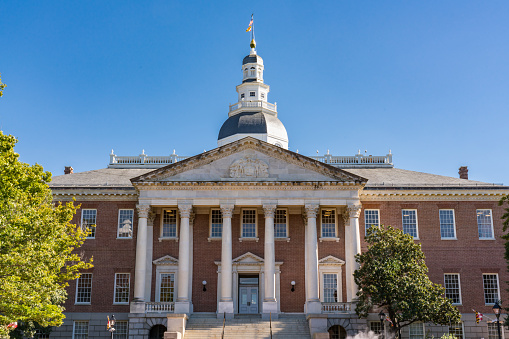 Boston, Massachusetts, USA - August 19, 2023: Entrance to the Baker Library on the Harvard Business School (HBS) campus. Dedicated in 1927 and named for George F. Baker, the benefactor who funded HBS's original campus. It is the largest business library in the world.