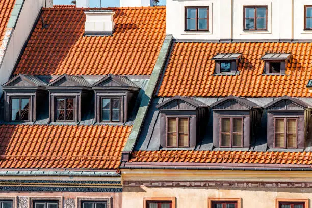 Warsaw, Poland old town market square with historic street town architecture and window roof rooftop closeup pattern