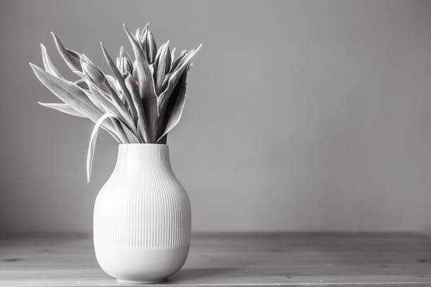 istock Tulips in vase, black and white 1097574934