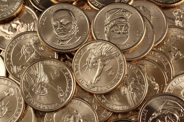 istock American golden dollar coins close up 1097577488