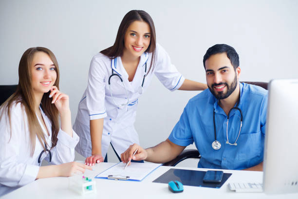 istock Group Of Happy Multiracial Doctors Working Together In Clinic 1097580948