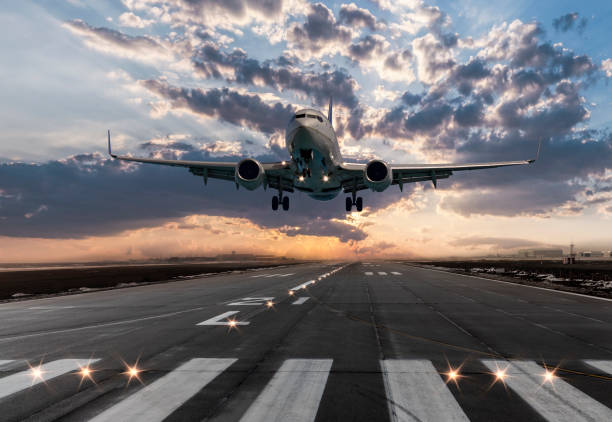 istock Passenger airplane taking off at sunset 1097582352
