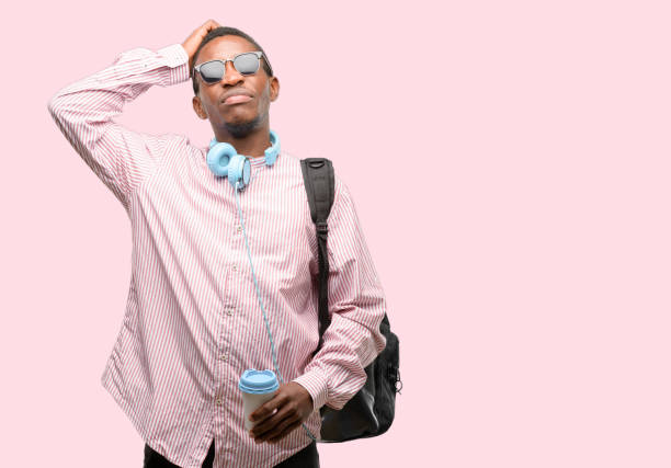 istock African black man student doubt expression, confuse and wonder concept, uncertain future 1097583788