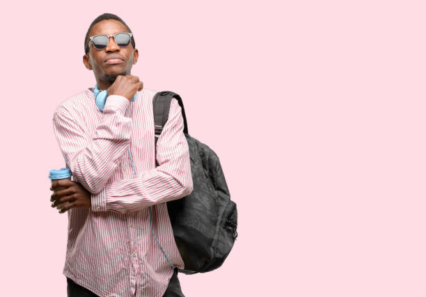 istock African black man student thinking and looking up expressing doubt and wonder 1097583856