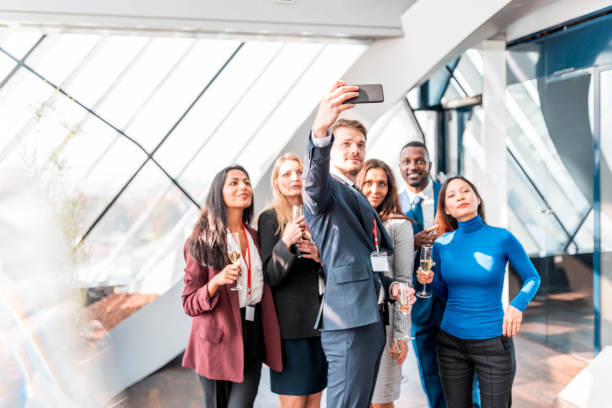 istock Group of business people taking a selfie 1097586464
