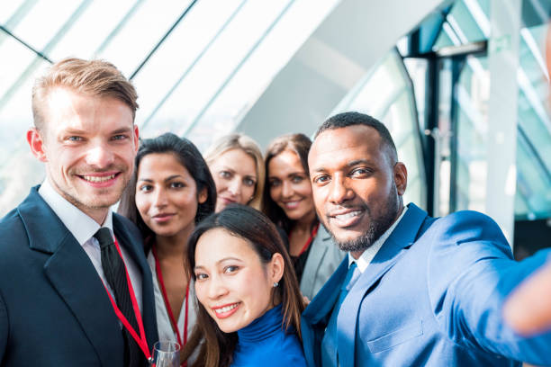 istock Group of business people taking a selfie 1097586752