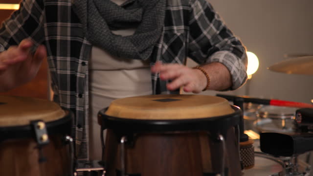 Musician Playing on Drums