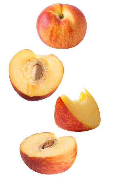 istock Flying peach fruits isolated on white background 1097595222