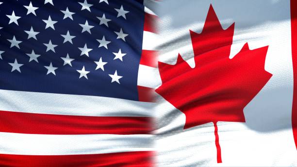 istock United States and Canada flags background, diplomatic and economic relations 1097601524