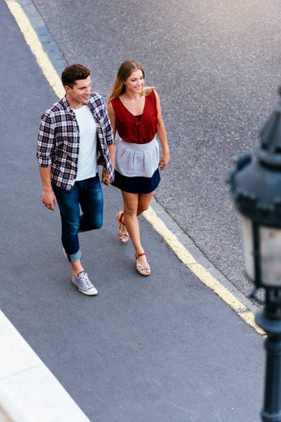 istock Romantic Young Couple Walking in the City 1097601586