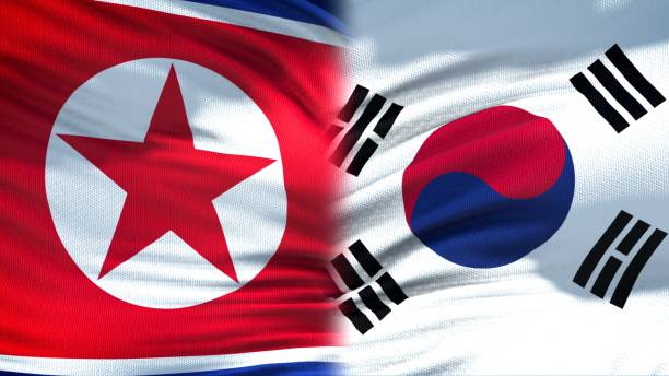 istock North Korea and South Korea flags background, diplomatic and economic relations 1097601808