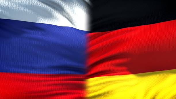 istock Russia and Germany flags background, diplomatic and economic relations, trade 1097602012